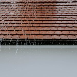 Water running down shingle roof