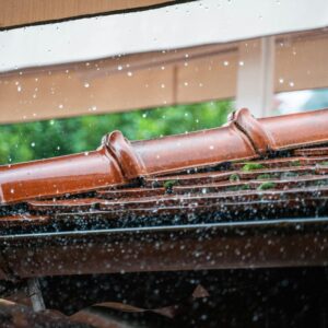  water falling on a shingle roof